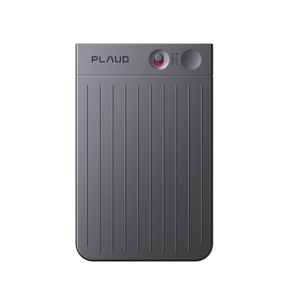 A dark black Plaud Note AI voice recorder is shown from above, featuring a red record dial and ribbed texture.