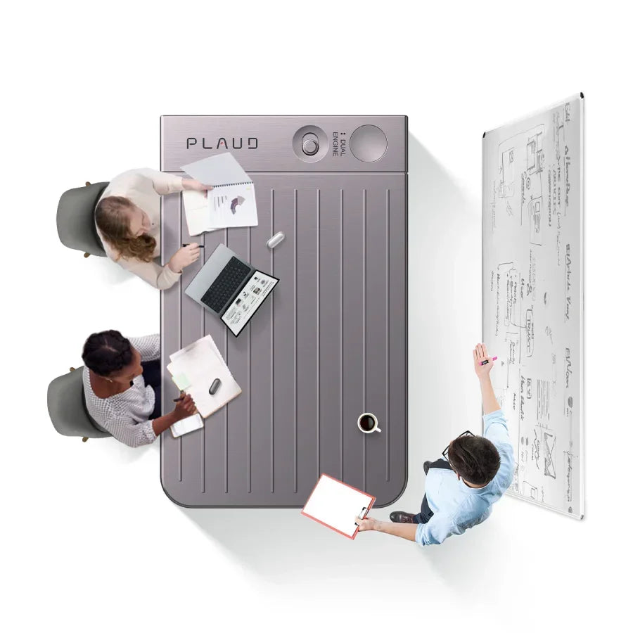 People meeting around a table shaped like a gray Plaud Note AI voice recorder.