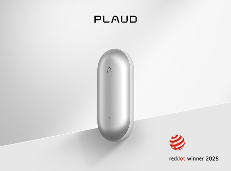 A silver Plaud NotePin stands upright on a white surface, with the Plaud logo above and a "reddot winner 2025" badge below.