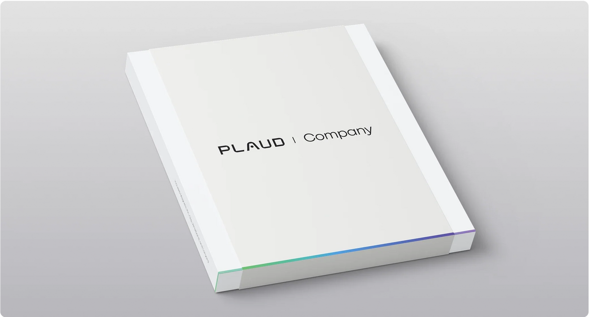 White Plaud Company product packaging box with a subtle colorful gradient on the bottom edge, set against a gray background.
