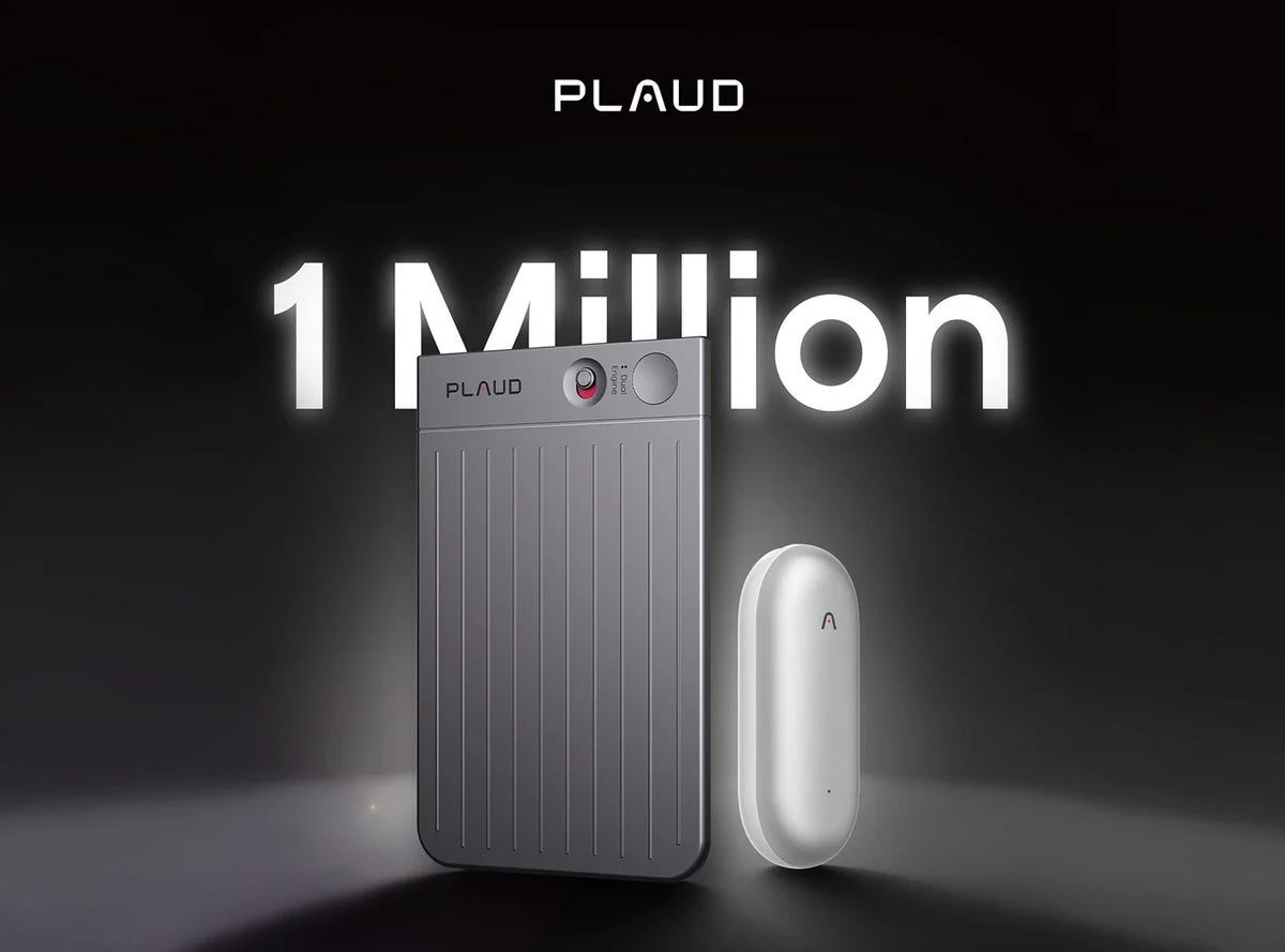 A gray Plaud Note and a white Plaud NotePin stand upright on a dark surface with glowing '1 Million' text in the background.